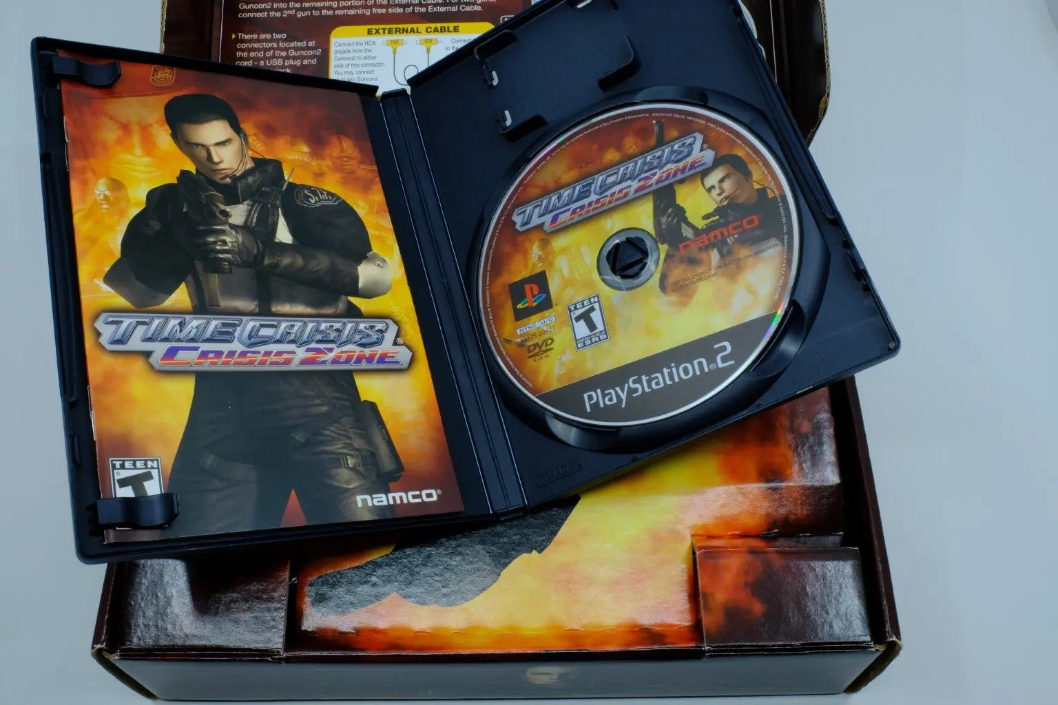 Time Crisis: Crisis Zone + Guncon2 – Complete in Box - RetroGate - Your Gateway to Classic Gaming