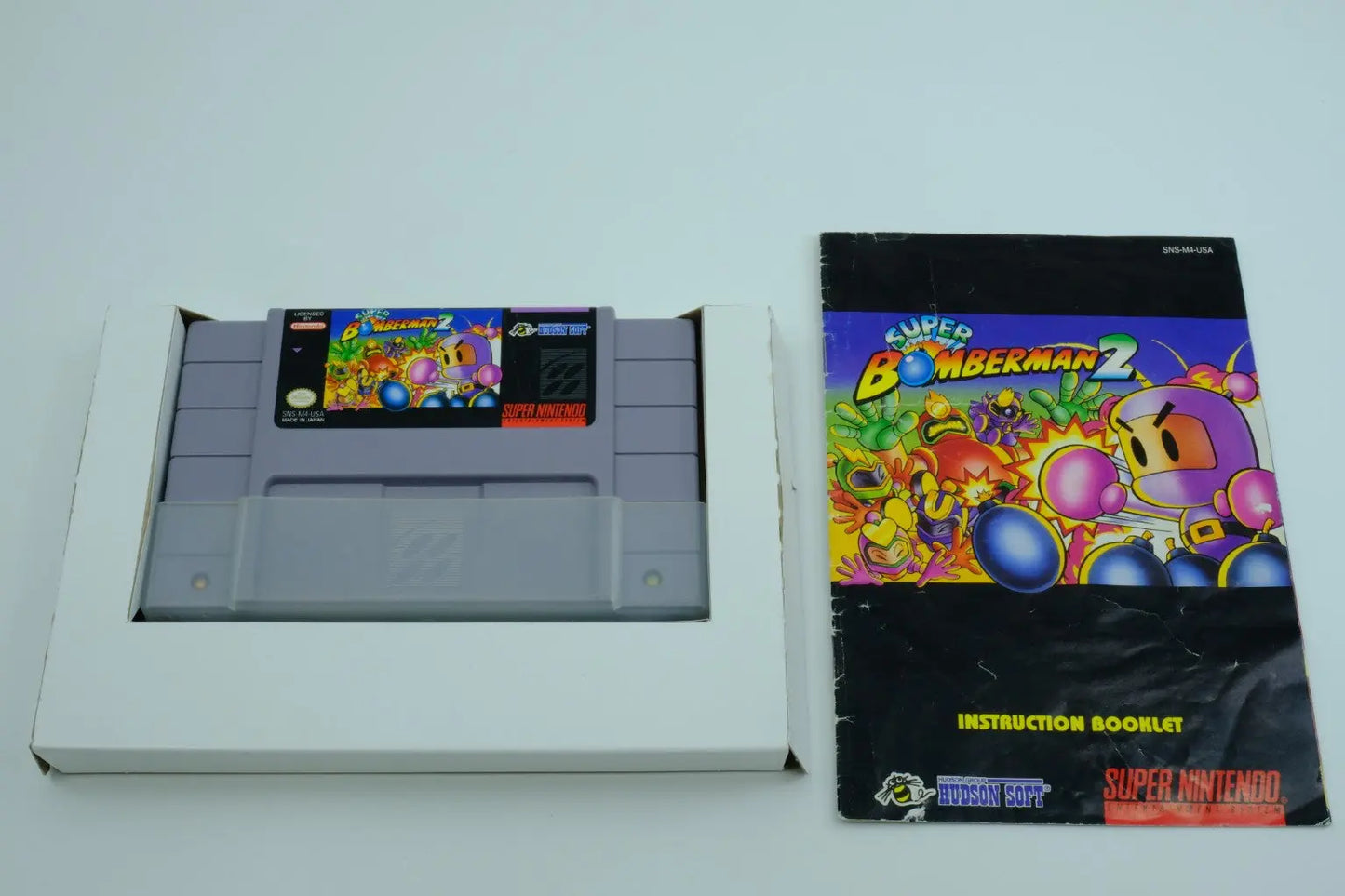 Super Bomberman 2 – Complete in Box RetroGate - Your Gateway to Classic Gaming
