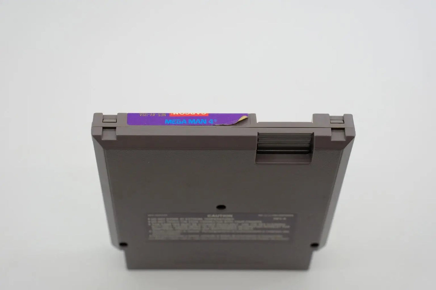 Mega Man 4 – Complete in Box RetroGate - Your Gateway to Classic Gaming