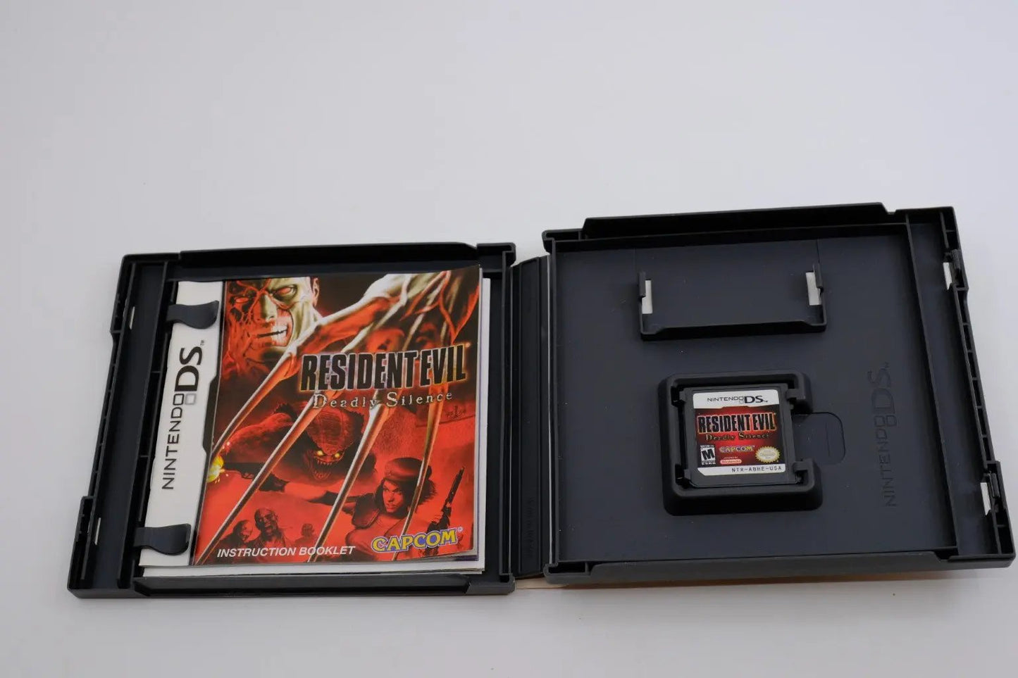 Resident Evil: Deadly Silence – Complete in Box RetroGate - Your Gateway to Classic Gaming
