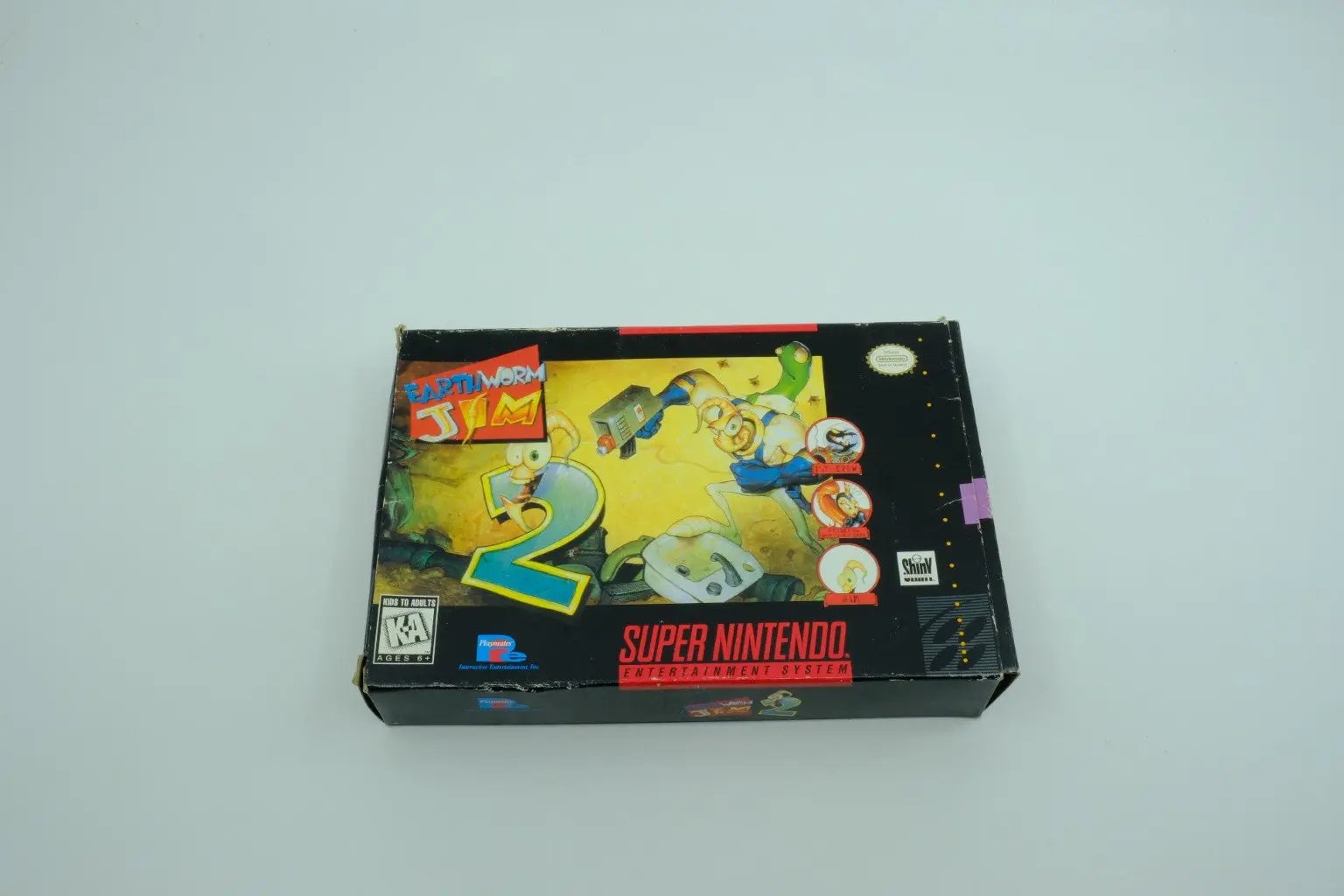 Earthworm Jim 2 – Complete in Box RetroGate - Your Gateway to Classic Gaming