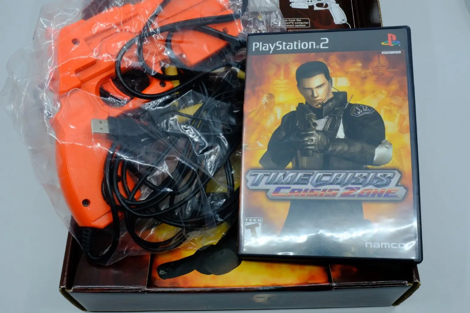 Time Crisis: Crisis Zone + Guncon2 – Complete in Box - RetroGate - Your Gateway to Classic Gaming