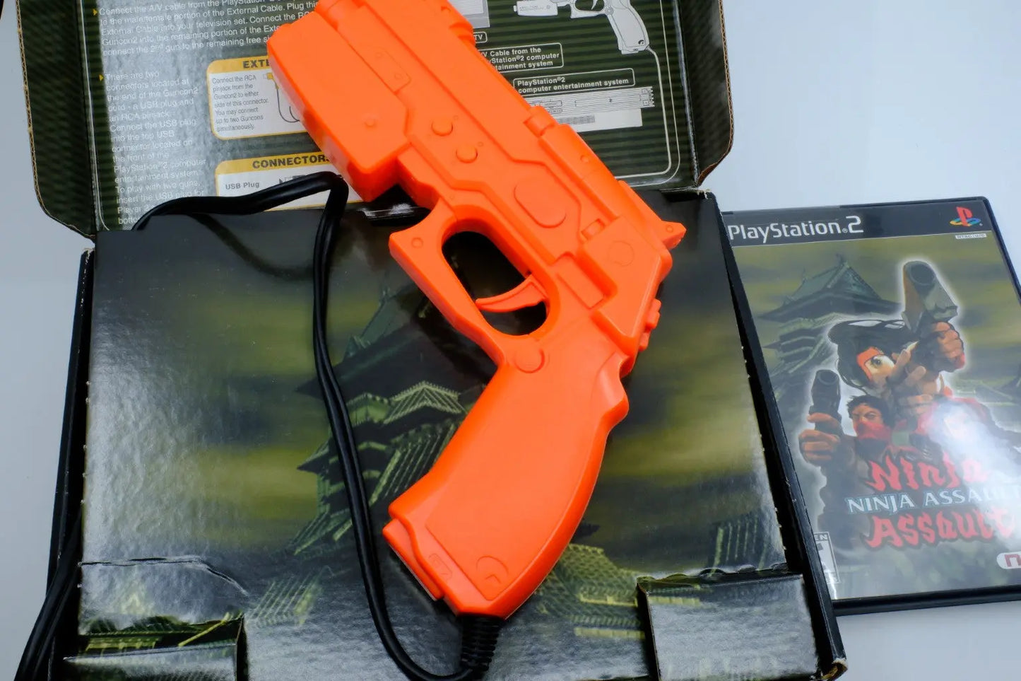 Ninja Assault + Guncon 2 — Complete in Box RetroGate - Your Gateway to Classic Gaming