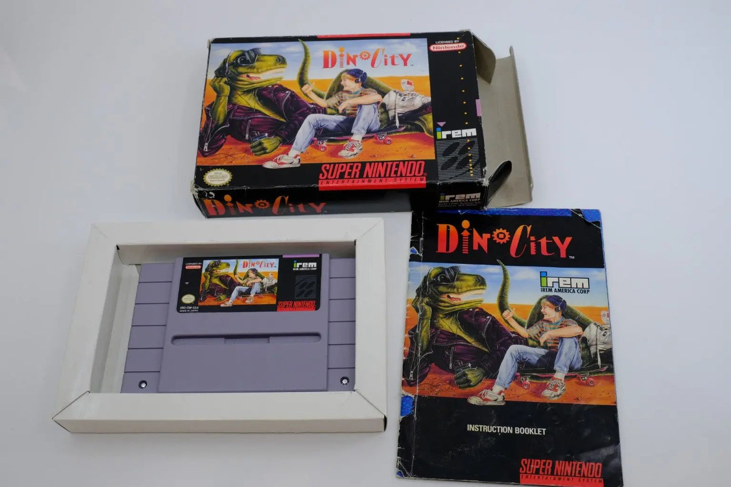 DinoCity – Complete in Box RetroGate - Your Gateway to Classic Gaming