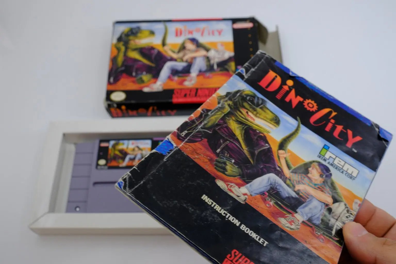 DinoCity – Complete in Box RetroGate - Your Gateway to Classic Gaming