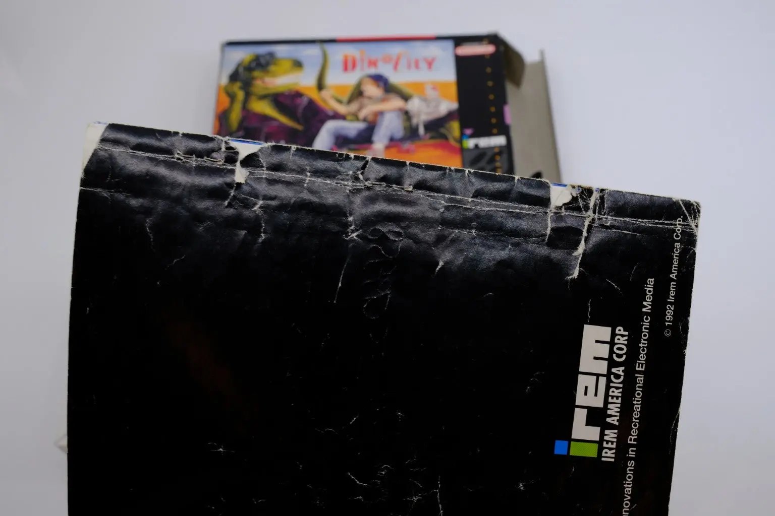 DinoCity – Complete in Box RetroGate - Your Gateway to Classic Gaming